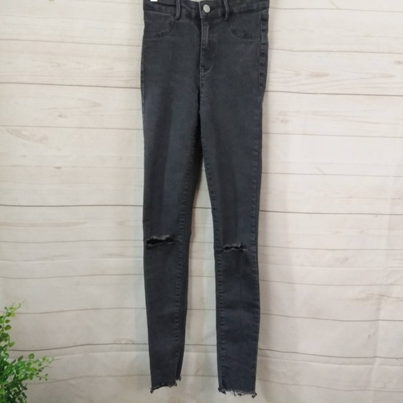 black raw edge jeans